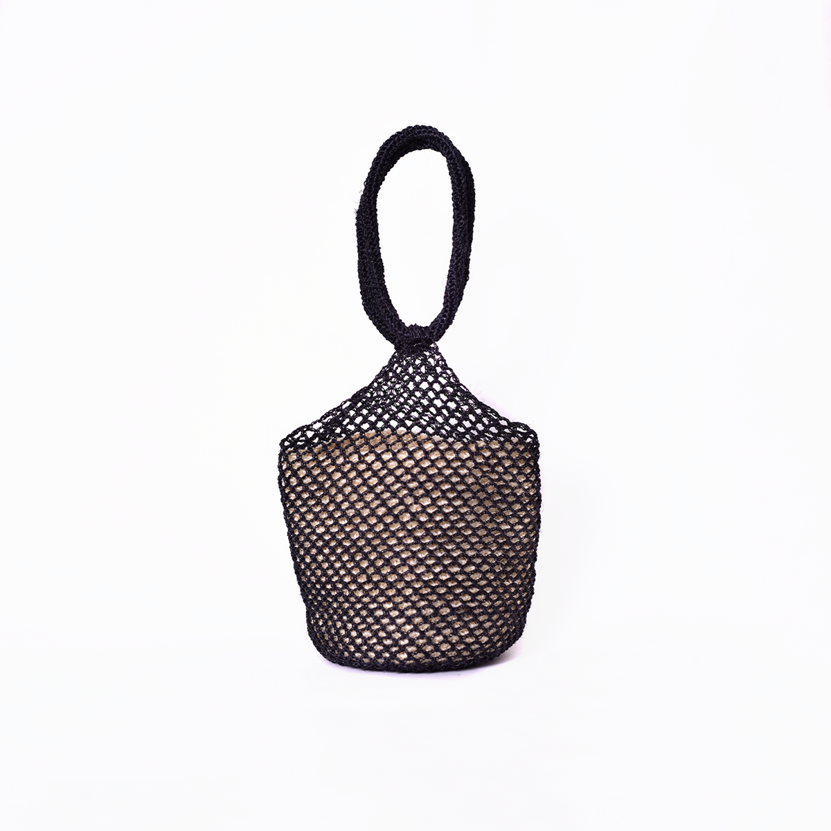 Bolso artesanal Ivanna tejido a mano en fibra natural de fique, hecho en Colombia. Accesorio sostenible, elegante y versátil para cualquier ocasión.